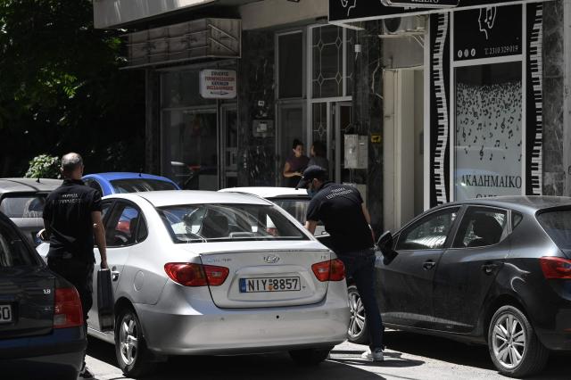 Police officers search an apartment in Thessaloniki on July 10, 2026. Police in Greece on July 10, 2026 said they had arrested three people in connection to attacks this month that targeted ruling party politicians, killing a woman in a car explosion. The July 1 attacks at dawn in the northern city of Thessaloniki targeted the homes and vehicles of three politicians from Greece's ruling New Democracy party with homemade gas canister explosives. (Photo by Sakis Mitrolidis / AFP)