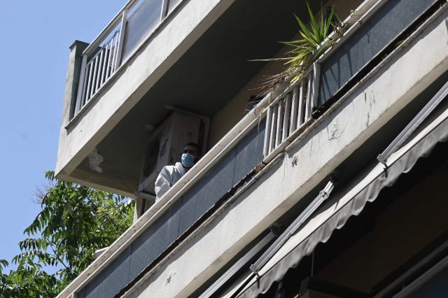Police officers search an apartment in Thessaloniki on July 10, 2026. Police in Greece on July 10, 2026 said they had arrested three people in connection to attacks this month that targeted ruling party politicians, killing a woman in a car explosion. The July 1 attacks at dawn in the northern city of Thessaloniki targeted the homes and vehicles of three politicians from Greece's ruling New Democracy party with homemade gas canister explosives. (Photo by Sakis Mitrolidis / AFP)