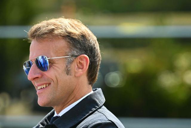 France's President Emmanuel Macron arrives to visit sports facilities in Loudenvielle, south-western France, on July 10, 2026. (Photo by Lionel BONAVENTURE / POOL / AFP)