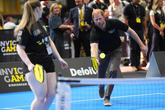 Britain's Prince Harry, Duke of Sussex, reacts as he takes part in a session of Pickleball during an event to mark the 'Invictus Games Birmingham 2027: One Year To Go', at the NEC in Birmingham, central England on July 10, 2026. (Photo by Aaron Chown / POOL / AFP)