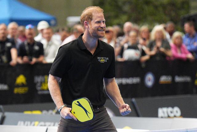Britain's Prince Harry, Duke of Sussex, reacts as he takes part in a session of Pickleball during an event to mark the 'Invictus Games Birmingham 2027: One Year To Go', at the NEC in Birmingham, central England on July 10, 2026. (Photo by Aaron Chown / POOL / AFP)