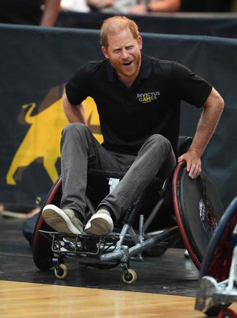 Britain's Prince Harry, Duke of Sussex, takes part in a session of wheelchair rugby during an event to mark the 'Invictus Games Birmingham 2027: One Year To Go', at the NEC in Birmingham, central England on July 10, 2026. (Photo by Aaron Chown / POOL / AFP)