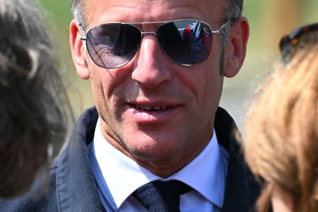France's President Emmanuel Macron arrives to visit sports facilities in Loudenvielle, south-western France, on July 10, 2026. (Photo by Lionel BONAVENTURE / POOL / AFP)