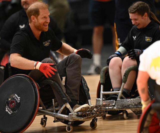Britain's Prince Harry, Duke of Sussex, reacts as he takes part in a session of wheelchair rugby during an event to mark the 'Invictus Games Birmingham 2027: One Year To Go', at the NEC in Birmingham, central England on July 10, 2026. (Photo by Oli SCARFF / AFP)