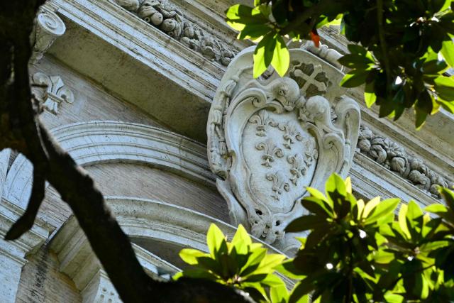 A picture shows the Farnese family coat of arms after its restoration at Palazzo Farnese, the French Embassy, in Rome on July 10, 2026. Hundreds of lion gargoyles designed by Michelangelo on the top of the building have been also restored to their Renaissance glory in Rome's Palazzo Farnese. The 300 sculptures on the cornice around the vast building -- each one different from the other -- were one of the highlights of the five-year restoration of the building's roof and facades. (Photo by Andreas SOLARO / AFP)