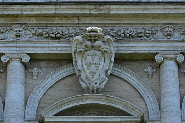 A picture shows the Farnese family coat of arms after its restoration at Palazzo Farnese, the French Embassy, in Rome on July 10, 2026. Hundreds of lion gargoyles designed by Michelangelo on the top of the building have been also restored to their Renaissance glory in Rome's Palazzo Farnese. The 300 sculptures on the cornice around the vast building -- each one different from the other -- were one of the highlights of the five-year restoration of the building's roof and facades. (Photo by Andreas SOLARO / AFP)