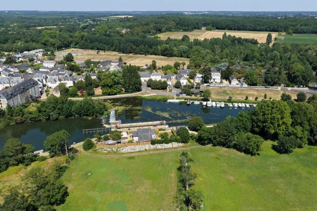 This aerial photograph shows a view of River Sarthe in Cheffes, western France, on July 10, 2026. (Photo by Damien MEYER / AFP)