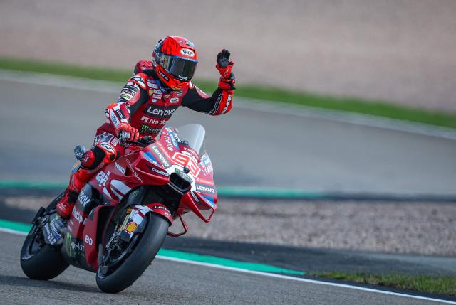 Team Ducati Lenovo Team's Marc Marquez waves after placing first in a practice session at the Sachsenring race track in Hohenstein-Ernstthal, Germany, on July 10, 2026, ahead of the German Motorcycle MotoGP Grand Prix. (Photo by Ronny HARTMANN / AFP)