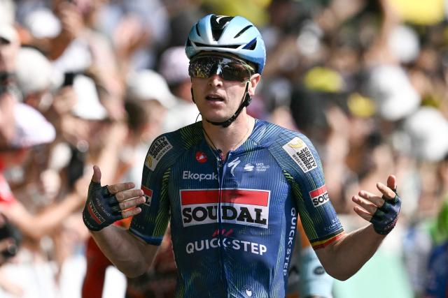Soudal Quick-Step team's Belgian rider Tim Merlier cycles to the finish line to win the 7th stage of the 113th edition of the Tour de France cycling race, 175 km between Hagetmau and Bordeaux in southwestern France, on July 10, 2026. (Photo by Jeff PACHOUD / AFP)