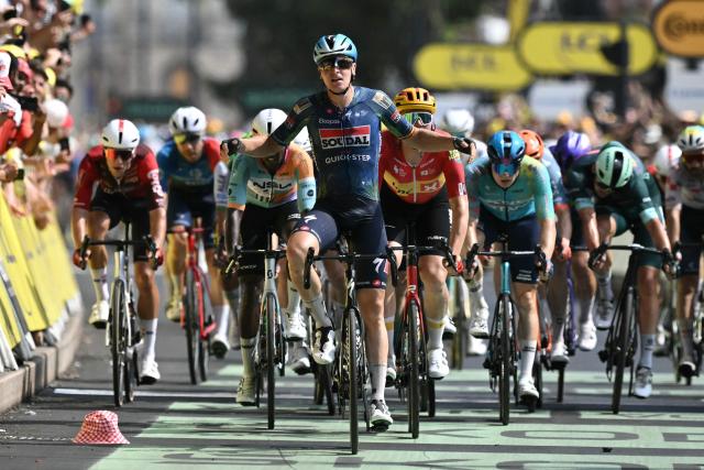 Soudal Quick-Step team's Belgian rider Tim Merlier cycles to the finish line to win the 7th stage of the 113th edition of the Tour de France cycling race, 175 km between Hagetmau and Bordeaux in southwestern France, on July 10, 2026. (Photo by Jeff PACHOUD / AFP)