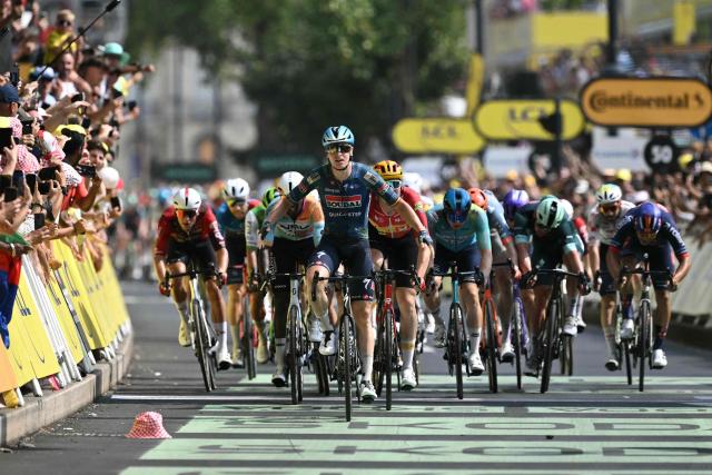 Soudal Quick-Step team's Belgian rider Tim Merlier cycles to the finish line to win the 7th stage of the 113th edition of the Tour de France cycling race, 175 km between Hagetmau and Bordeaux in southwestern France, on July 10, 2026. (Photo by Jeff PACHOUD / AFP)