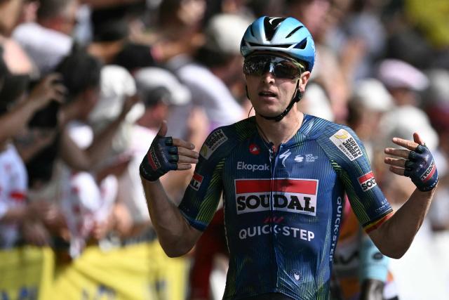 Soudal Quick-Step team's Belgian rider Tim Merlier cycles to the finish line to win the 7th stage of the 113th edition of the Tour de France cycling race, 175 km between Hagetmau and Bordeaux in southwestern France, on July 10, 2026. (Photo by Jeff PACHOUD / AFP)
