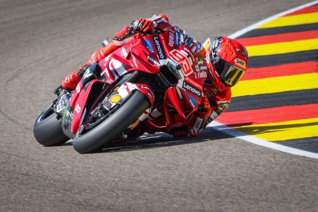 Team Ducati Lenovo Team's Marc Marquez steers his motorbike during a practice session at the Sachsenring race track in Hohenstein-Ernstthal, Germany, on July 10, 2026, ahead of the German Motorcycle MotoGP Grand Prix. (Photo by Ronny HARTMANN / AFP)