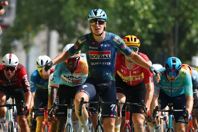 Soudal Quick-Step team's Belgian rider Tim Merlier cycles to the finish line to win the 7th stage of the 113th edition of the Tour de France cycling race, 175 km between Hagetmau and Bordeaux in southwestern France, on July 10, 2026. (Photo by Anne-Christine POUJOULAT / AFP)