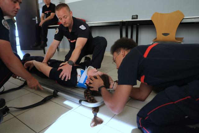 Firefighters of Departmental Fire and Rescue Service (SDIS 77) attend a training at a fire station in Ferrières-en-Brie, the eastern suburbs of Paris, on July 10, 2026. With 36°C in the fire station and some improvised DIY solutions, firefighters are also suffering from the heatwave hitting France. (Photo by Thomas SAMSON / AFP)