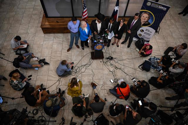 Hugo Balderas-Ibarra (C), the attorney for the individuals arrested during the operation in which Lorenzo Salgado Araujo was shot and killed by an ICE agent, speaks during a news conference to discuss the case, in Houston, Texas, on July 10, 2026. Lorenzo Salgado Araujo was killed by an Immigration and Customs Enforcement (ICE) officer in Houston, Texas, early on July 7, marking the first fatal shooting involving US immigration officers since two January killings in the northern city of Minneapolis that drew national headlines. (Photo by RONALDO SCHEMIDT / AFP)