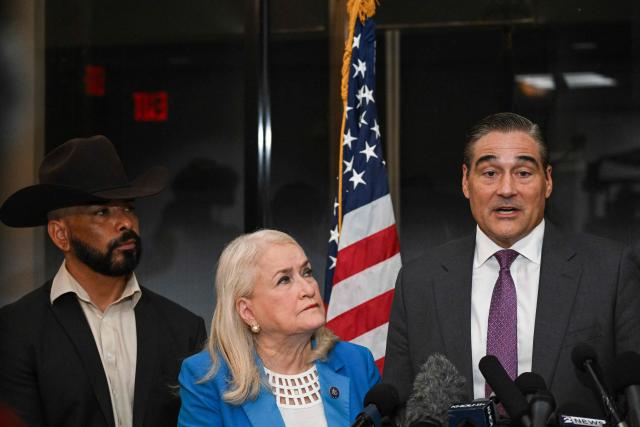 Sean Teare (R), Harris County District Attorney, speaks alongside US Representative Slyvia Garcia (C), Democrat from Texas, and attorney Hugo Balderas-Ibarra (L) during a news conference to discuss the case of Lorenzo Salgado Araujo, in Houston, Texas, on July 10, 2026. Lorenzo Salgado Araujo was killed by an Immigration and Customs Enforcement (ICE) officer in Houston, Texas, early on July 7, marking the first fatal shooting involving US immigration officers since two January killings in the northern city of Minneapolis that drew national headlines. (Photo by RONALDO SCHEMIDT / AFP)