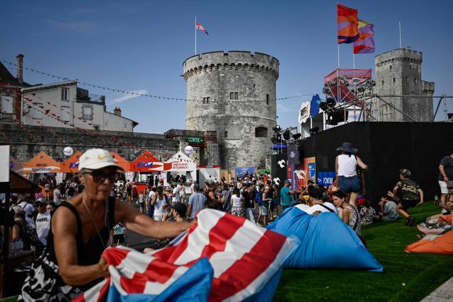 Spectators attend the Francofolies music festival during its 42nd edition, in La Rochelle, western France on July 10, 2025. (Photo by Philippe LOPEZ / AFP)