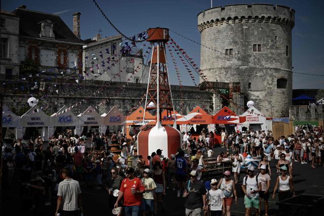 Spectators attend the Francofolies music festival during its 42nd edition, in La Rochelle, western France on July 10, 2025. (Photo by Philippe LOPEZ / AFP)