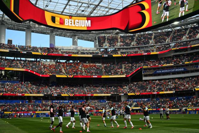 Belgium's players warm up ahead of the 2026 World Cup football tournament quarter-final match between Spain and Belgium at the Los Angeles Stadium in Inglewood on July 10, 2026.  (Photo by Patrick T. Fallon / AFP)