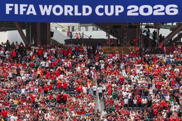 Spanish fans cheer for their team ahead of the 2026 World Cup football tournament quarter-final match between Spain and Belgium at the Los Angeles Stadium in Inglewood on July 10, 2026.  (Photo by ETIENNE LAURENT / AFP)