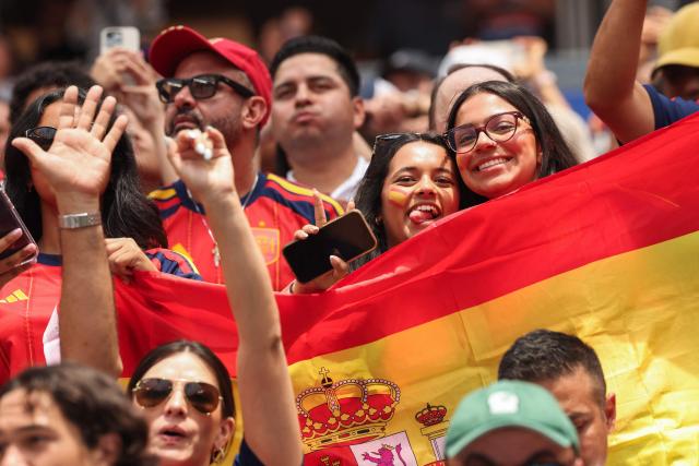 Spanish fans cheer for their team ahead of the 2026 World Cup football tournament quarter-final match between Spain and Belgium at the Los Angeles Stadium in Inglewood on July 10, 2026.  (Photo by ETIENNE LAURENT / AFP)