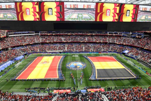 Spain and Belgium flags are displayed on the pitch ahead of the 2026 World Cup football tournament quarter-final match between Spain and Belgium at the Los Angeles Stadium in Inglewood on July 10, 2026.  (Photo by VALERIE MACON / AFP)