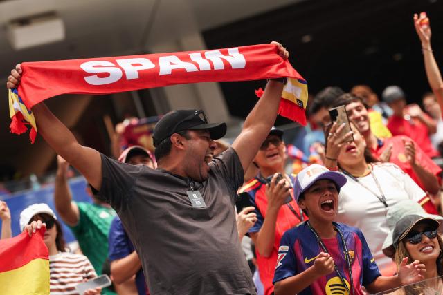 Spanish fans cheer for their team ahead of the 2026 World Cup football tournament quarter-final match between Spain and Belgium at the Los Angeles Stadium in Inglewood on July 10, 2026.  (Photo by ETIENNE LAURENT / AFP)