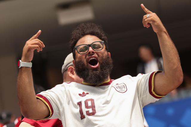 A Spanish fan cheers for his team ahead of the 2026 World Cup football tournament quarter-final match between Spain and Belgium at the Los Angeles Stadium in Inglewood on July 10, 2026.  (Photo by ETIENNE LAURENT / AFP)