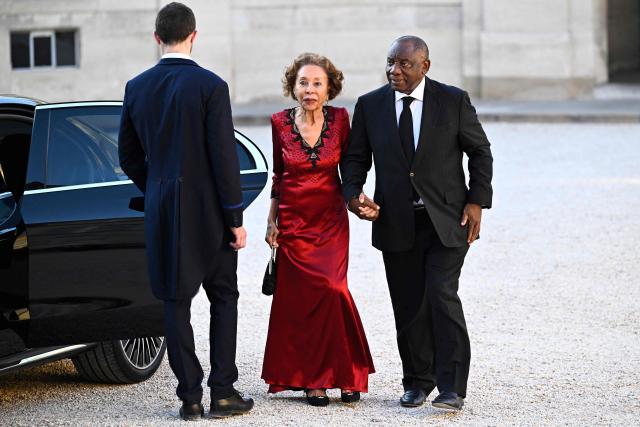 South Africa's President Cyril Ramaphosa (R) and South Africa's President's wife Tshepo Motsepe arrive at The Elysee Presidential Palace ahead of an official state dinner in Paris on July 10, 2026. (Photo by JULIEN DE ROSA / AFP)