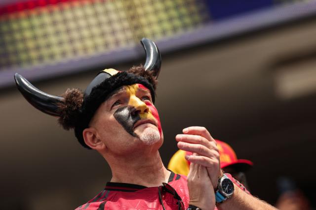 A Belgian fan cheers for his team ahead of the 2026 World Cup football tournament quarter-final match between Spain and Belgium at the Los Angeles Stadium in Inglewood on July 10, 2026.  (Photo by ETIENNE LAURENT / AFP)