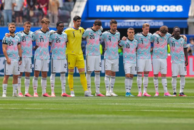 Belgium's players observe a minute of silence for the victims of the fires in Almeria ahead of the 2026 World Cup football tournament quarter-final match between Spain and Belgium at the Los Angeles Stadium in Inglewood on July 10, 2026.  (Photo by Etienne LAURENT / AFP)
