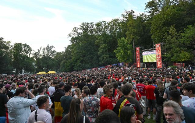 Fans watch the 2026 World Cup quarter final football match between Spain and Belgium in Uccle near Brussels on July 10, 2026. (Photo by Nicolas TUCAT / AFP)