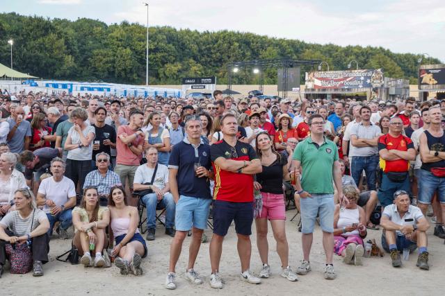 Fans watch a screening of the 2026 World Cup quarter final football match between Spain and Belgium at the Rock Zottegem music festival in Zottegem on July 10, 2026. (Photo by NICOLAS MAETERLINCK / Belga / AFP) / Belgium OUT