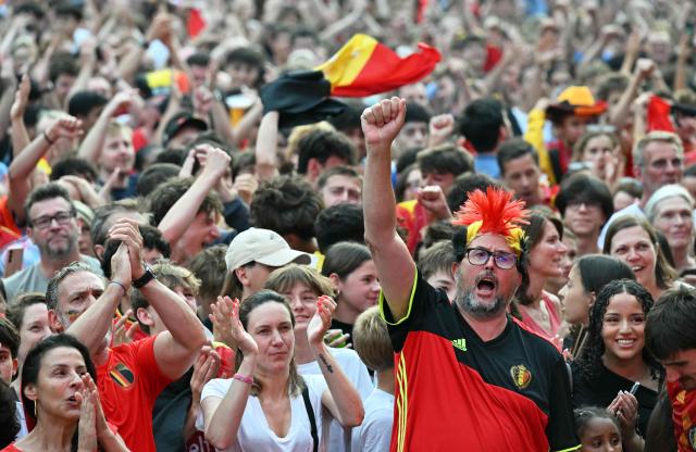 Fans react at a fan zone ahead of the 2026 World Cup quarter final football match between Spain and Belgium in Uccle near Brussels on July 10, 2026. (Photo by NICOLAS TUCAT / AFP)