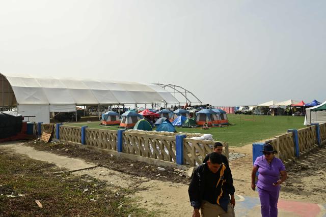 View of a temporary shelter in Playa Grande, Catia la Mar, state of La Guaira, Venezuela, on July 10, 2026, following the June 24 twin earthquakes. The death toll from the powerful double earthquake has risen to at least 3,889, whilst the number of injured remains at almost 17,000, and nearly 18,000 people were left homeless according to the last official reports. (Photo by MARTIN BERNETTI / AFP)