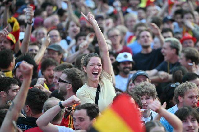Fans react after Belgium's first goal during the 2026 World Cup quarter final football match between Spain and Belgium in Uccle near Brussels on July 10, 2026. (Photo by NICOLAS TUCAT / AFP)