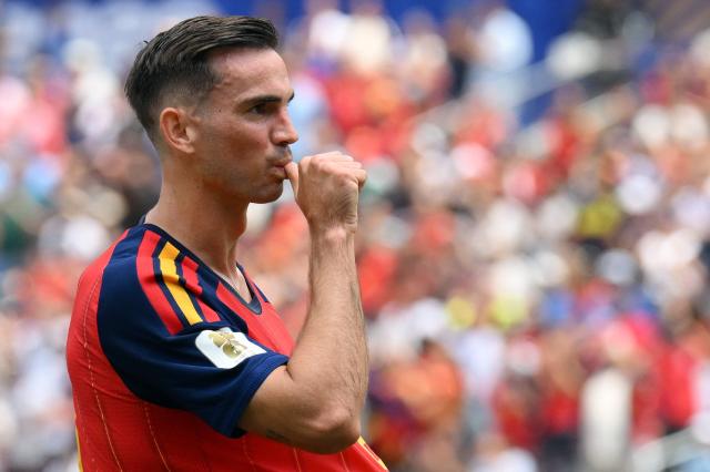 Spain's midfielder #08 Fabian Ruiz celebrates scoring his team's first goal during the 2026 World Cup football tournament quarter-final match between Spain and Belgium at the Los Angeles Stadium in Inglewood on July 10, 2026.  (Photo by Patrick T. Fallon / AFP)