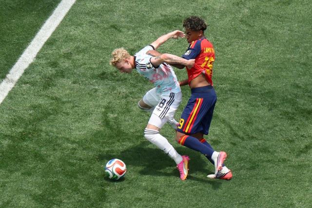 Belgium's defender #18 Joaquin Seys and Spain's forward #19 Lamine Yamal fight for the ball during the 2026 World Cup football tournament quarter-final match between Spain and Belgium at the Los Angeles Stadium in Inglewood on July 10, 2026.  (Photo by VALERIE MACON / AFP)