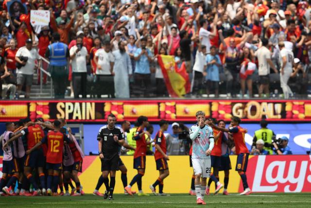 Belgium's forward #22 Alexis Saelemaekers reacts after conceding Spain's second goal scored by midfielder #06 Mikel Merino (unseen) during the 2026 World Cup football tournament quarter-final match between Spain and Belgium at the Los Angeles Stadium in Inglewood on July 10, 2026.  (Photo by Patrick T. Fallon / AFP)