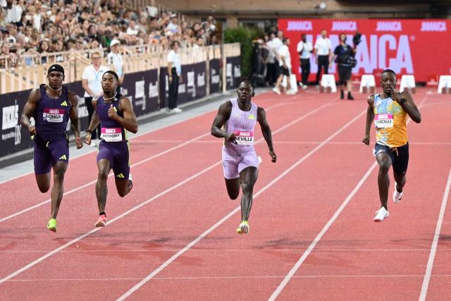 Jamaica's Oblique Seville (C) competes in the men's 100m during the Diamond League athletics meeting at the Stade Louis II in Monaco on July 10, 2026. (Photo by Frederic DIDES / AFP)