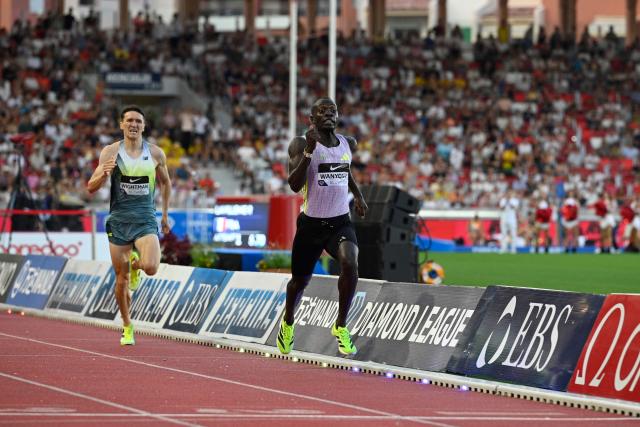 Kenya's Emmanuel Wanyonyi (R) competes in the men's 1000m during the Diamond League athletics meeting at the Stade Louis II in Monaco on July 10, 2026. (Photo by Frederic Dides / AFP)