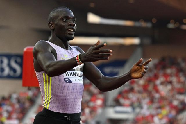 Kenya's Emmanuel Wanyonyi celebrates winning the men's 1000m during the Diamond League athletics meeting at the Stade Louis II in Monaco on July 10, 2026. (Photo by Frederic Dides / AFP)