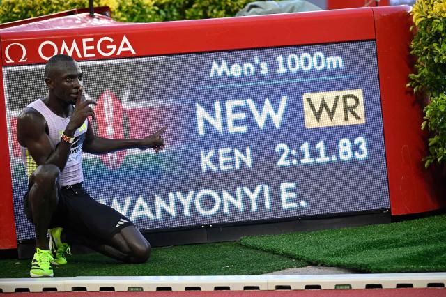 Kenya's Emmanuel Wanyonyi celebrates after setting a new World Record in the men's 1000m during the Diamond League athletics meeting at the Stade Louis II in Monaco on July 10, 2026. (Photo by Frederic Dides / AFP)