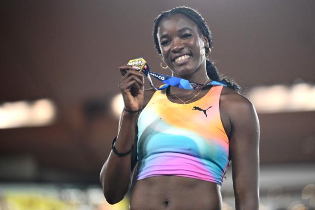 Cuba's Leyanis Perez Hernandez stands on the podium with her medal at the end of the Diamond League athletics meeting at the Stade Louis II in Monaco on July 10, 2026. (Photo by Frederic DIDES / AFP)