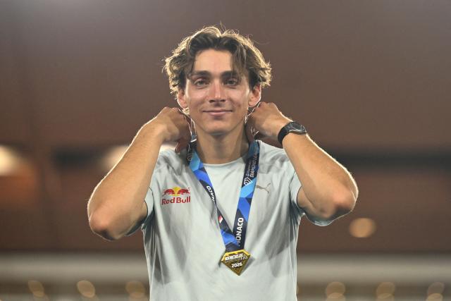 Sweden's Armand Duplantis stands on the podium with his medal at the end of the Diamond League athletics meeting at the Stade Louis II in Monaco on July 10, 2026. (Photo by Frederic DIDES / AFP)