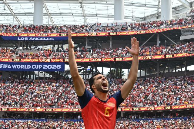 TOPSHOT - Spain's midfielder #06 Mikel Merino celebrates scoring his team's second goal during the 2026 World Cup football tournament quarter-final match between Spain and Belgium at the Los Angeles Stadium in Inglewood on July 10, 2026.  (Photo by Paul ELLIS / AFP)