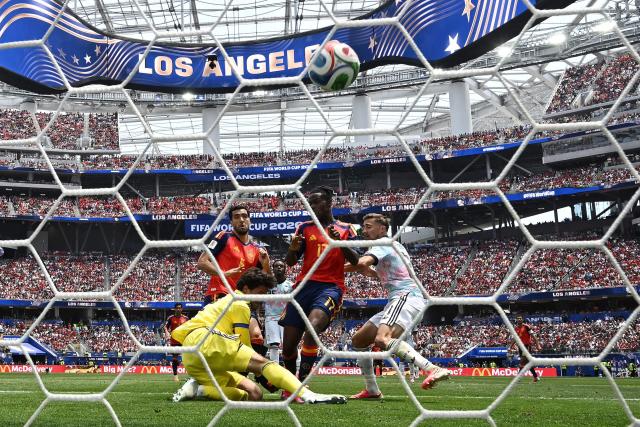 Spain's midfielder #06 Mikel Merino scores his team's second goal during the 2026 World Cup football tournament quarter-final match between Spain and Belgium at the Los Angeles Stadium in Inglewood on July 10, 2026.  (Photo by Paul ELLIS / AFP)