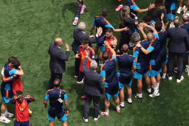 Spain's players and staff celebrate after winning the 2026 World Cup football tournament quarter-final match between Spain and Belgium at the Los Angeles Stadium in Inglewood on July 10, 2026.  (Photo by VALERIE MACON / AFP)