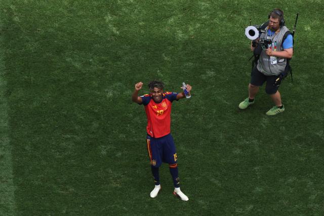 Spain's forward #19 Lamine Yamal celebrates after winning the 2026 World Cup football tournament quarter-final match between Spain and Belgium at the Los Angeles Stadium in Inglewood on July 10, 2026.  (Photo by VALERIE MACON / AFP)